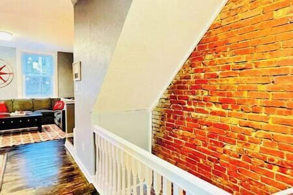 There are 3 floors in the house with two sets of carpeted steps.