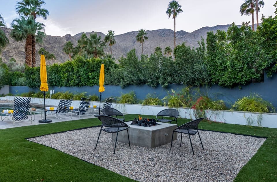 Evenings by the pool with gas fire pit and desert skies.