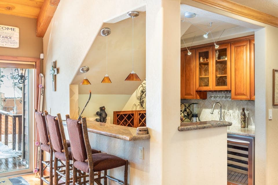 Cozy corner bar in the living room is the perfect place to grab a drink.