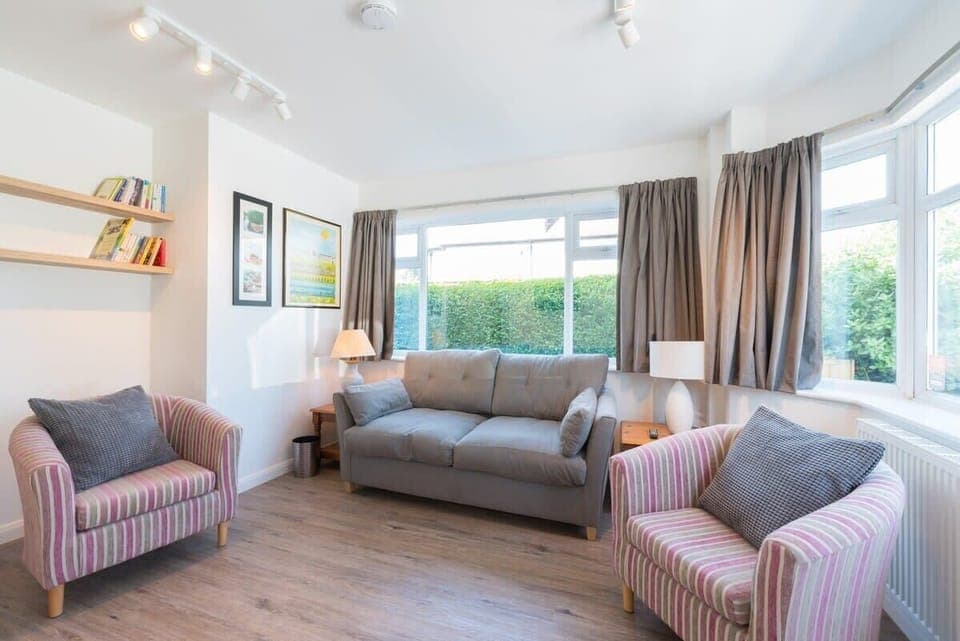 Beautiful large and light lounge with John Lewis double fold-down sofa. A proper mattress not a foam one : )