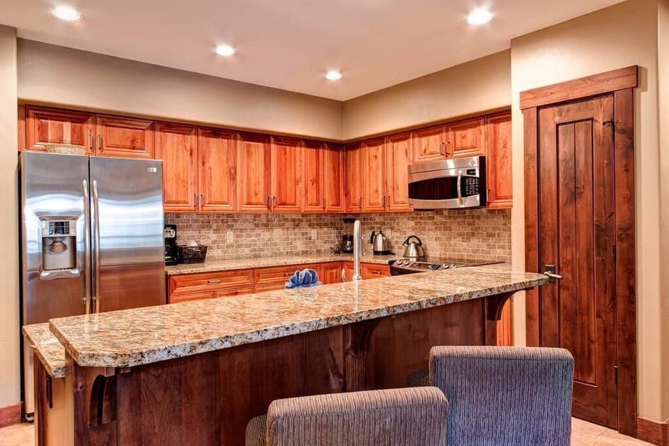 Breckenridge Crystal Peak Lodge Unit 7403 Kitchen with Breakfast Bar