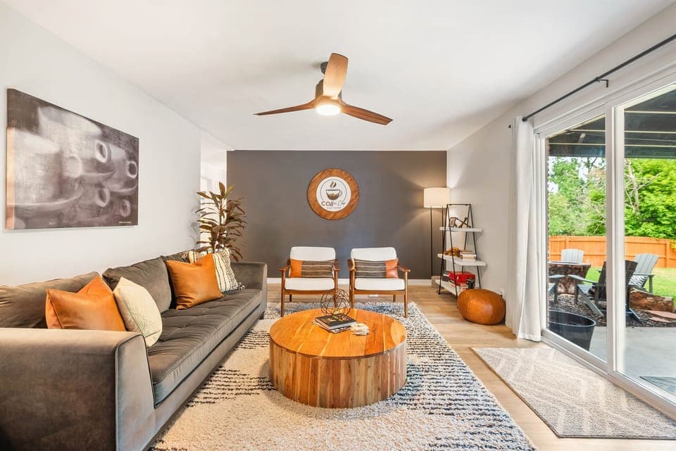 Easily access outdoor living on the patio through the living room’s sliders