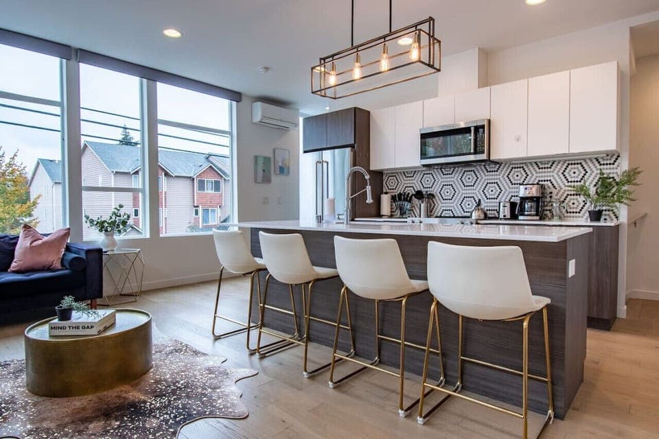 Enjoy large windows in main living space for natural light. Open layout to enjoy both kitchen and living space.