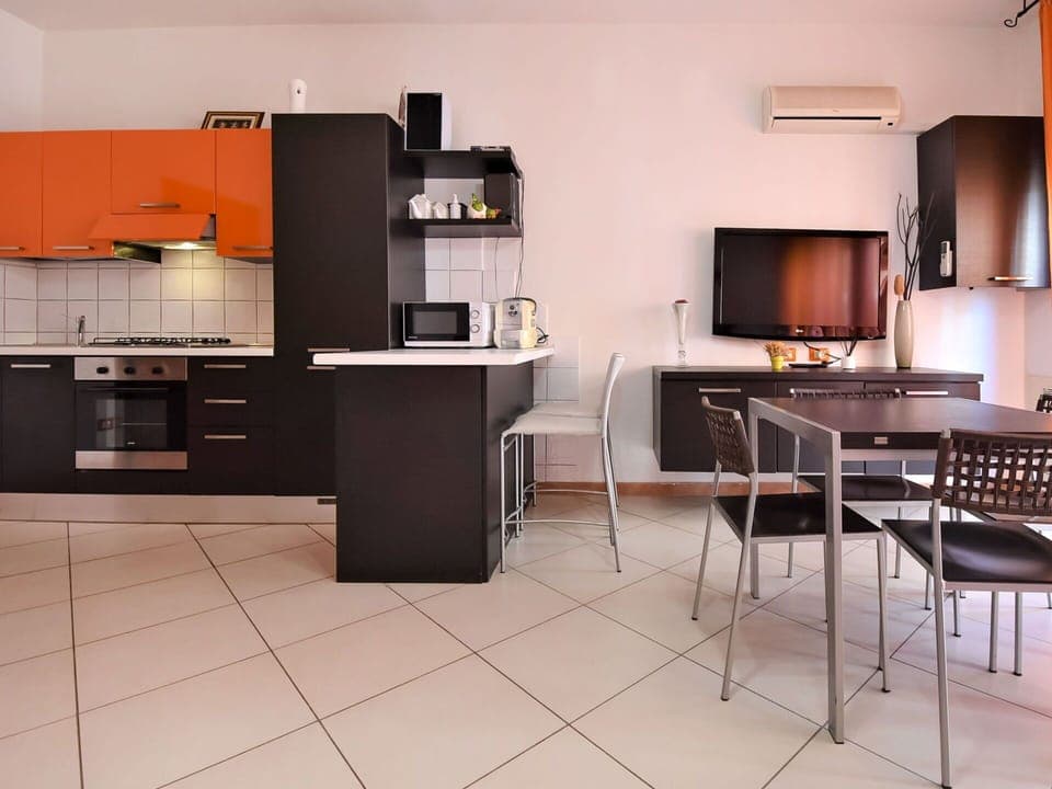 Cabinetry, Countertop, Table, Building, Kitchen Stove, Kitchen Appliance, Home Appliance, Wood, Kitchen, Floor