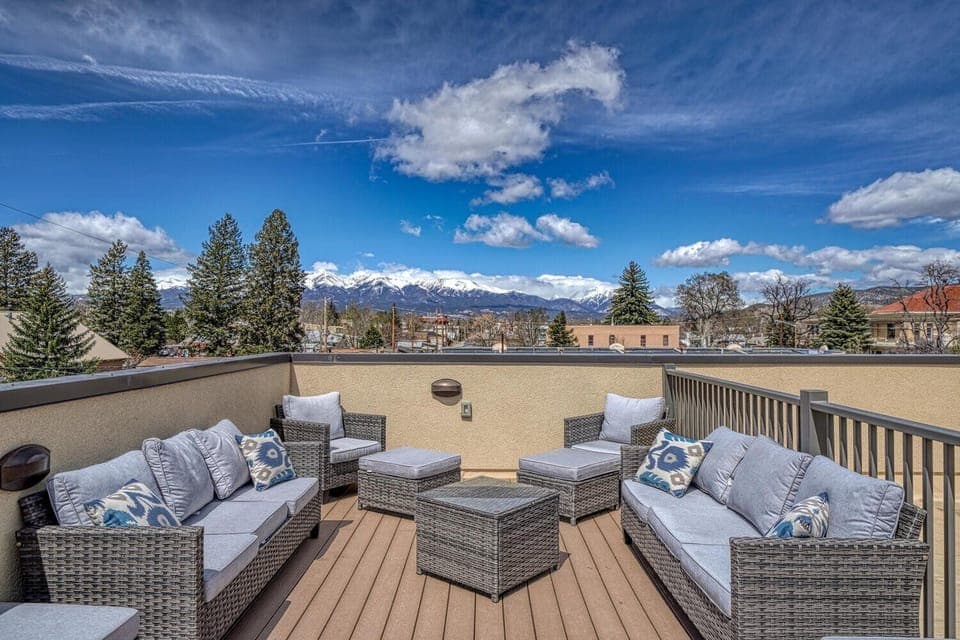 Unwind and relax on the rooftop patio with breathtaking 360 degree views of the surrounding mountains
