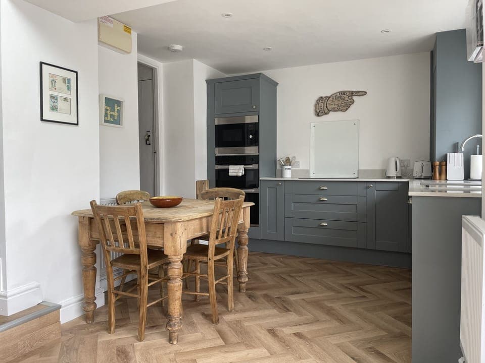 Kitchen - Double oven, induction hob, microwave.  Breakfast table