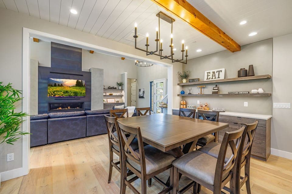 Dining Area With Seating For 8 And Designer Light Fixture