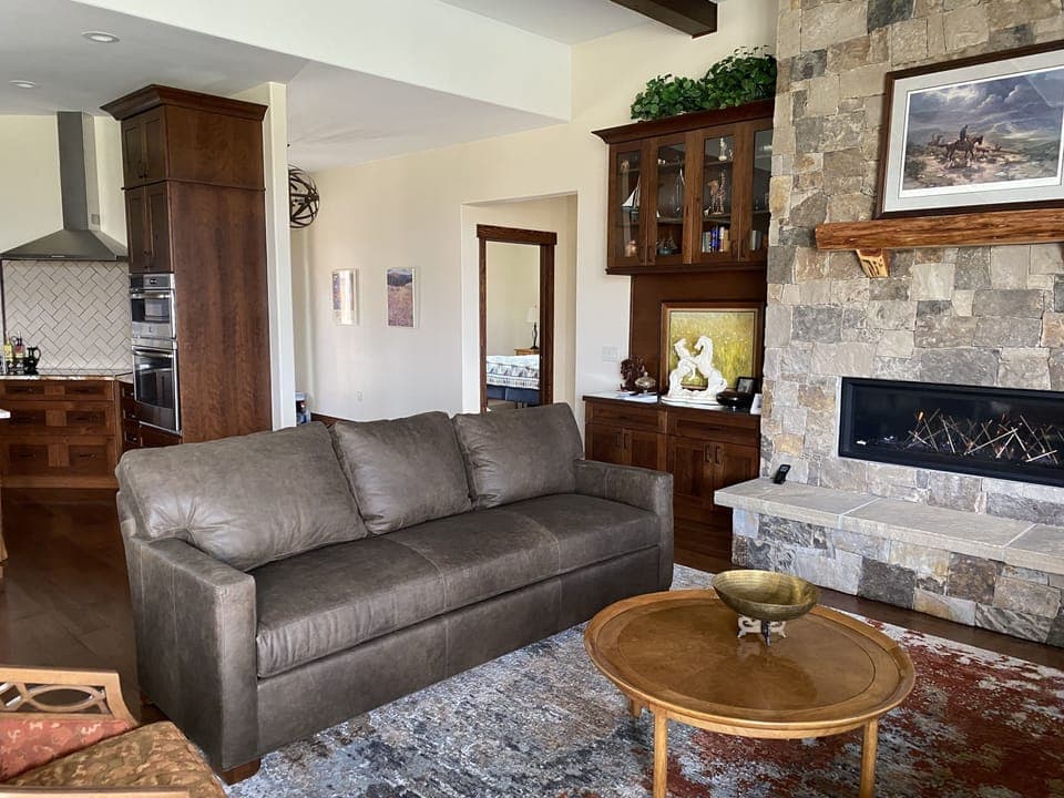 Luxurious seating for 8-10 people in living room.