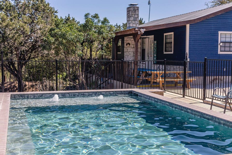 Exterior view of house with swimming pool