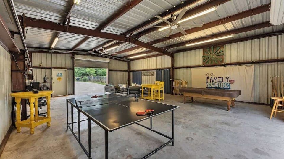 The barn includes a ping-pong table, pool table, and extra full-sized refrigerator.