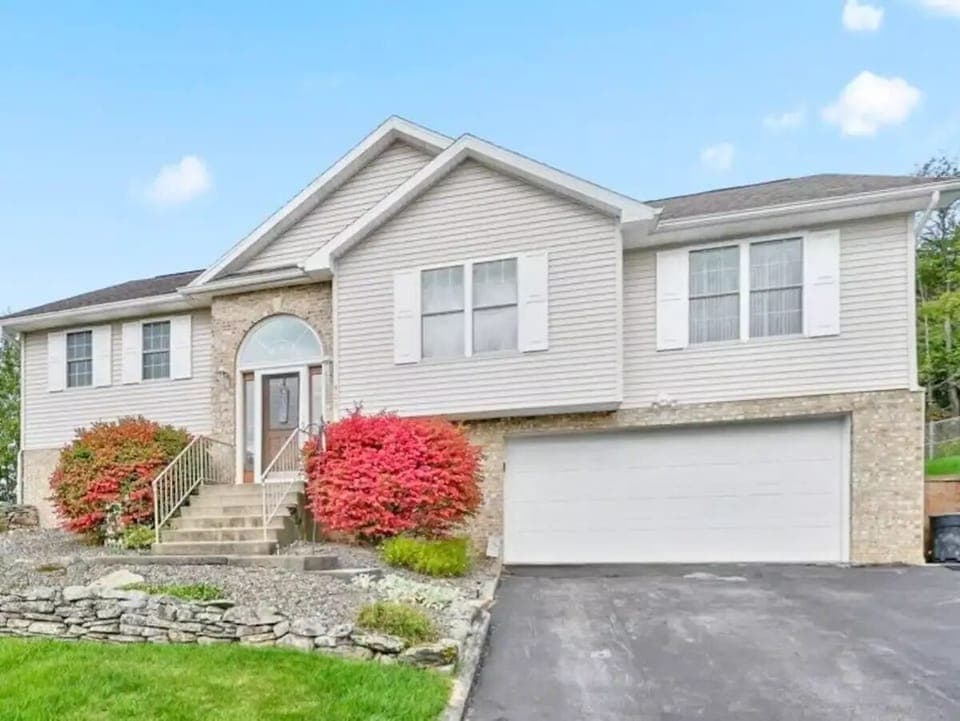 Enjoy this high-ranch home with 2000 sqft of living space.