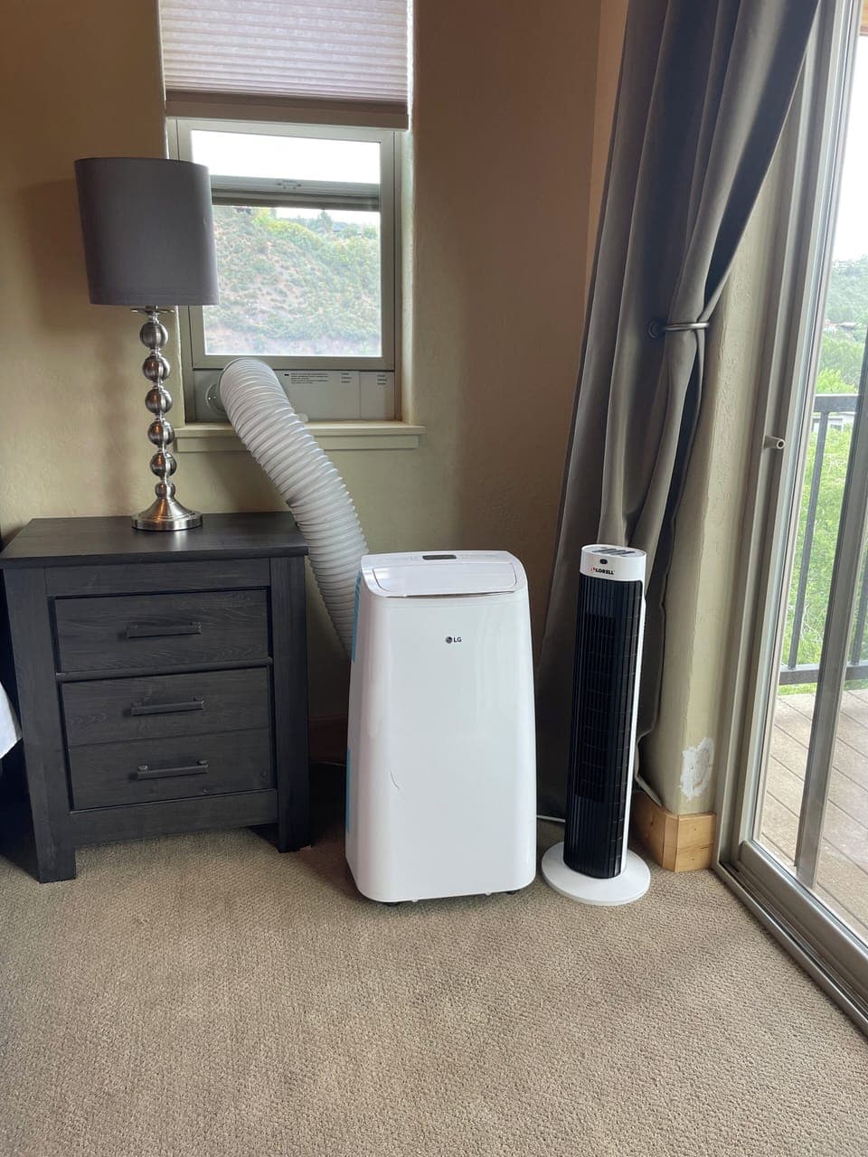Portable A/C & tower fan for added comfort (Yes, there is central AC)