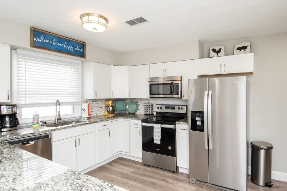 Remodeled large kitchen with granite countertops and stainless appliances