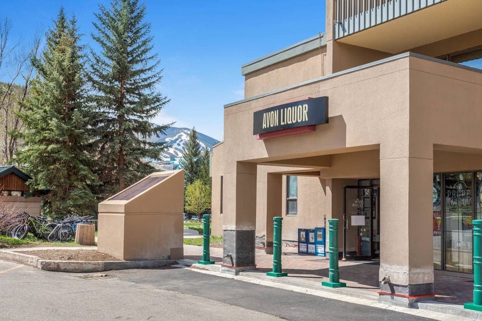 Avon Liquor conveniently located at the base of the building.