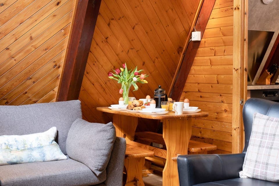 Wolf Lodge with dining table and couch