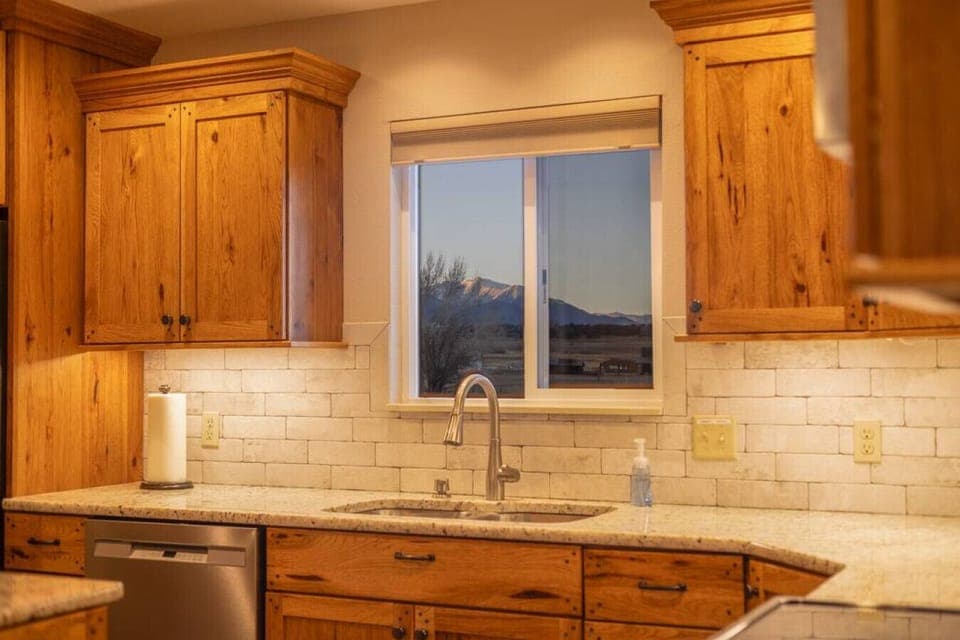 Capture views of the collegiate peaks throughout the home