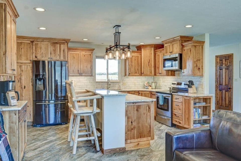 Prepare your favorite meal in the fully stocked kitchen