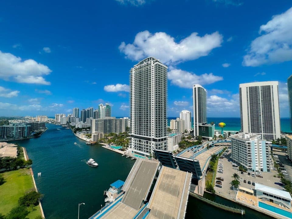 Private balcony with outdoor seating and skyline views.