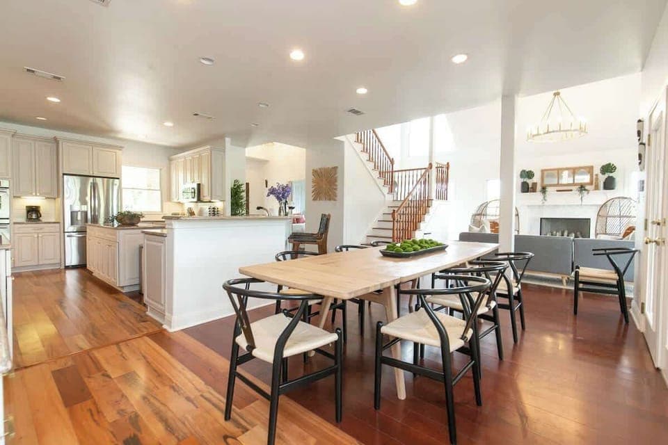 Enjoy a meal with family and friends at the large dinner table.