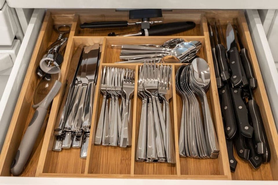 Cook delicious meals in our Chef's kitchen, fully stocked with coffee, cookware, dishes, silverware, oil, spices, and all your other cooking needs.