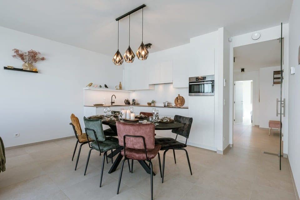 Fully installed kitchen with seating area