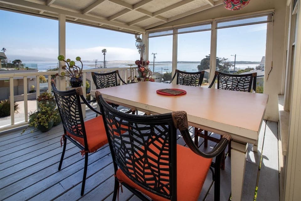 Expansive bay views are offered from this deck off the living area and master bedroom. Soak it up