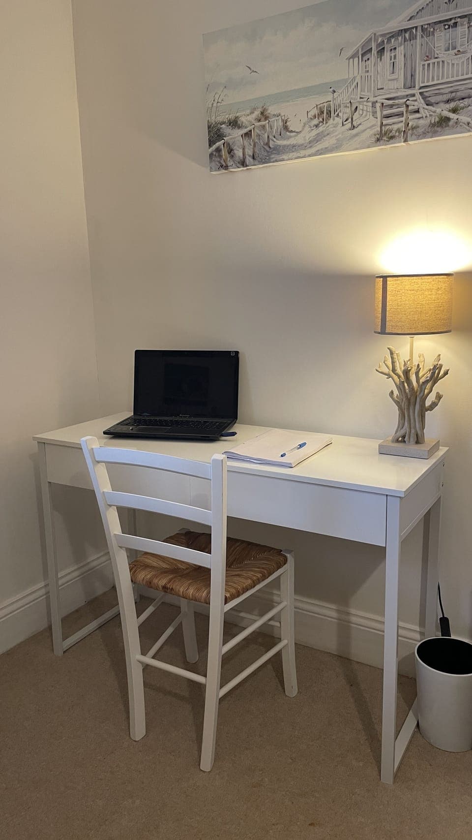 The desk located in the second bedroom offers space to work if needed