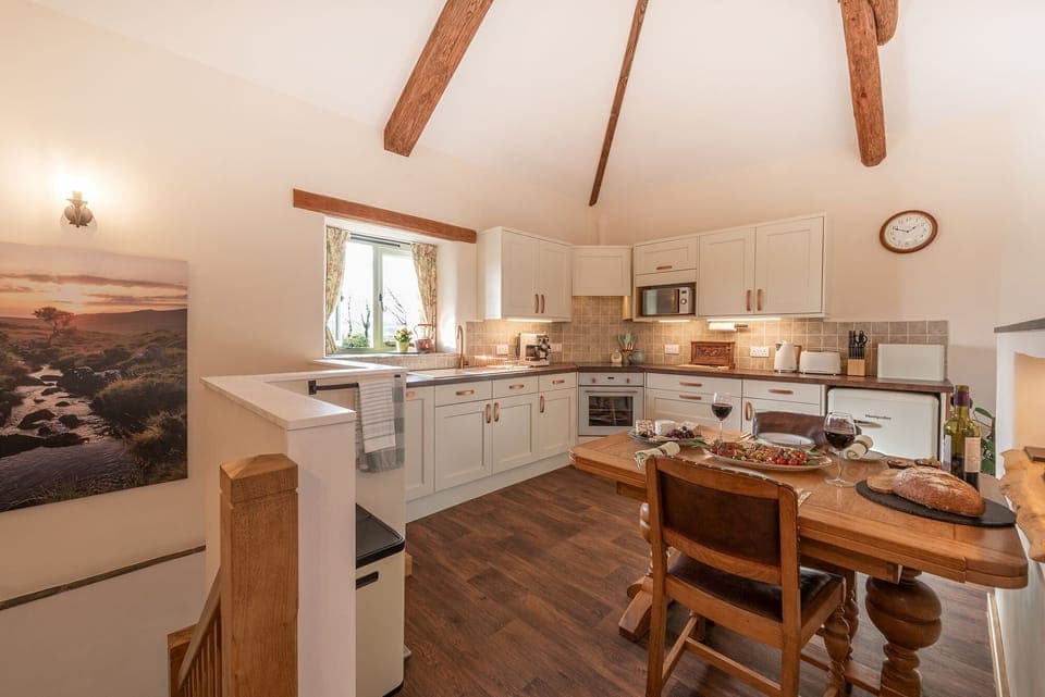 Large upstairs fully equipped kitchen with dining area for eating in