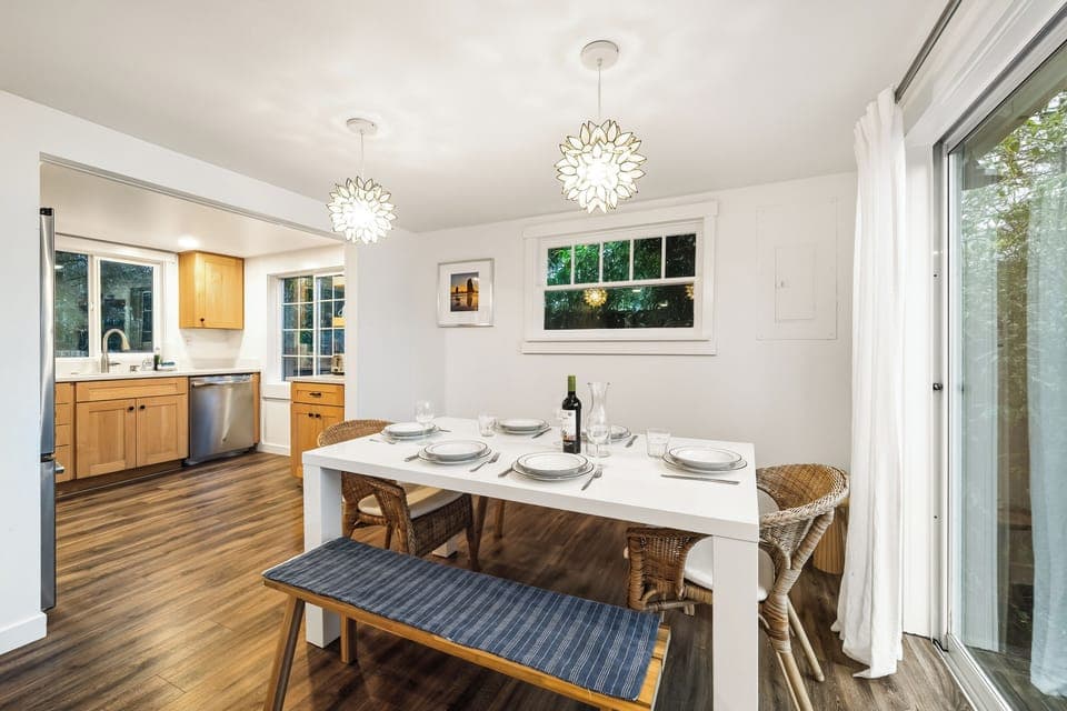 Dining room open to the living room. Sliding door to front deck.