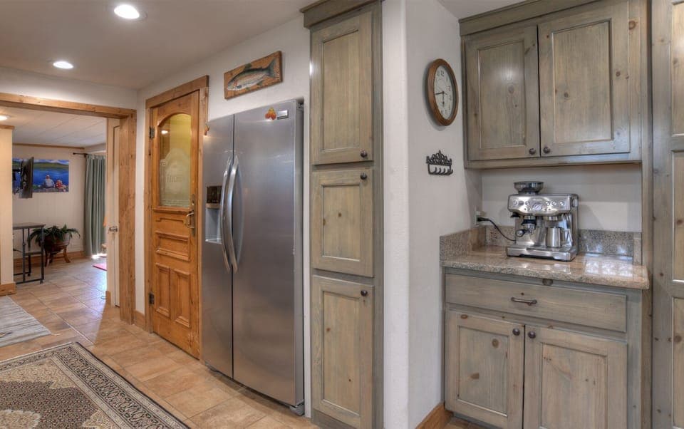 Gourmet kitchen with coffee bar, both drip coffee maker and expresso maker.