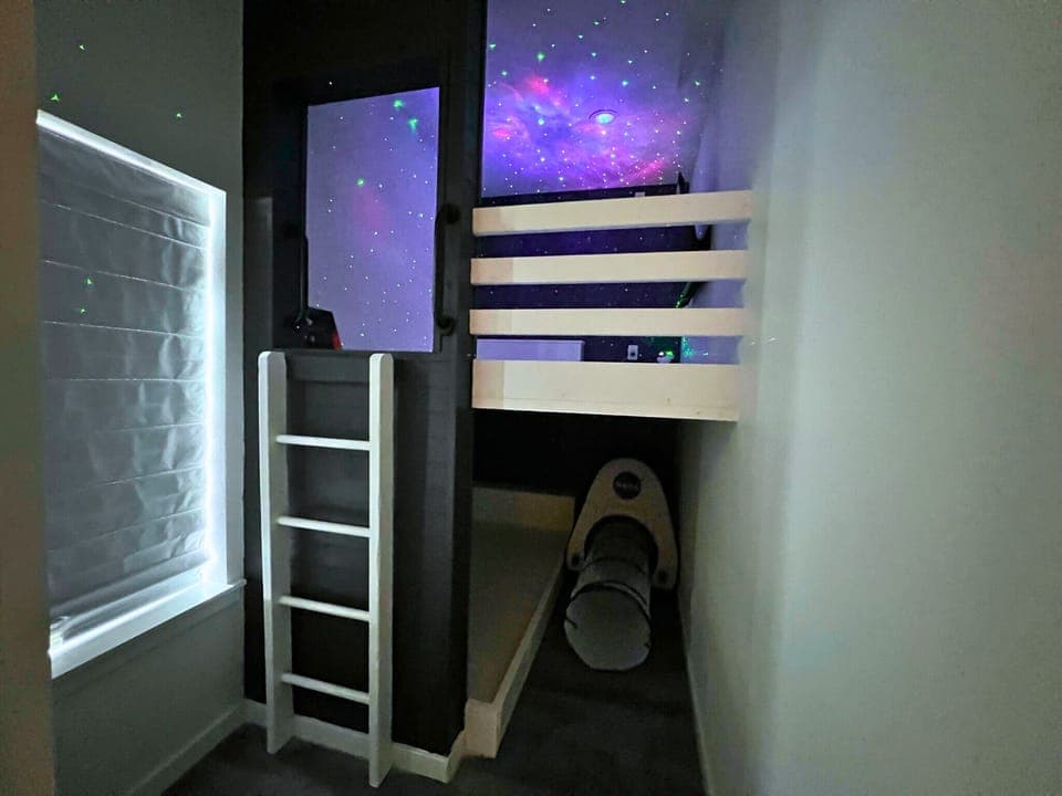 Kids will blast off into fun in this galaxy-inspired room.
