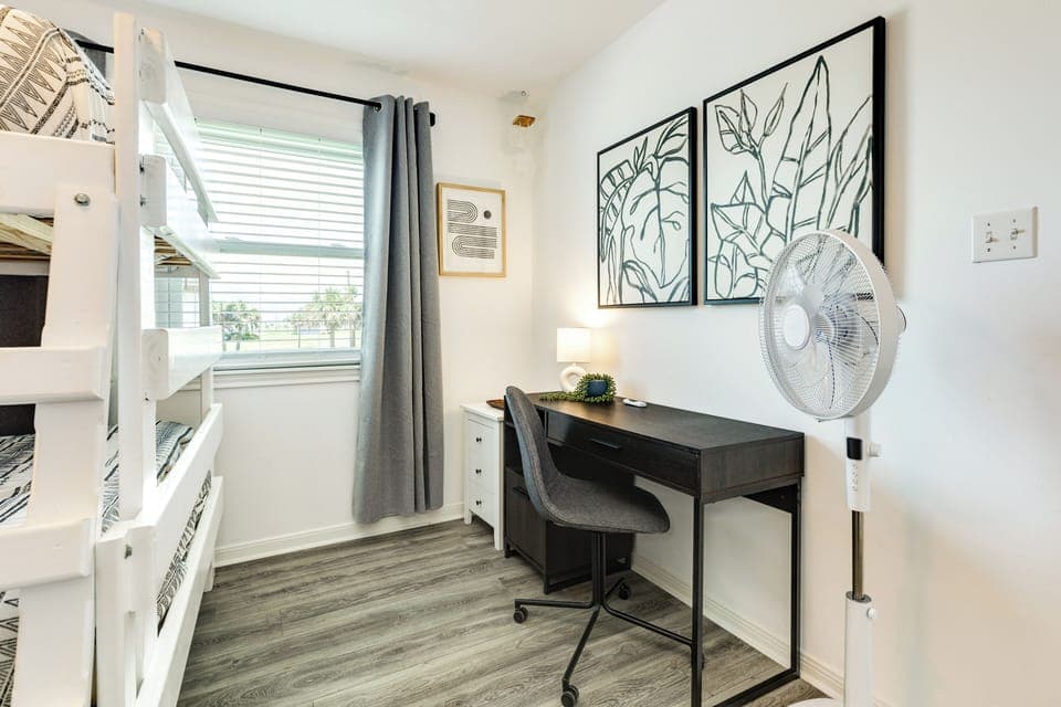 Desk area and tv makes a great space for the kids or teens in your group