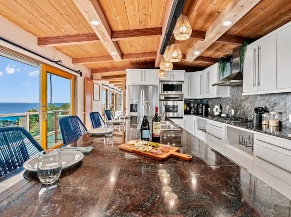 Oversized Kitchen Island and a Chefs Gourmet Kitchen with views that will be sure to add excitement to your cooking experience 