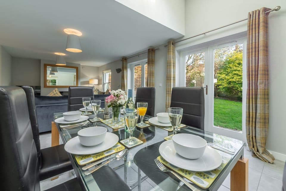 Ground floor: The dining area has french doors into the garden