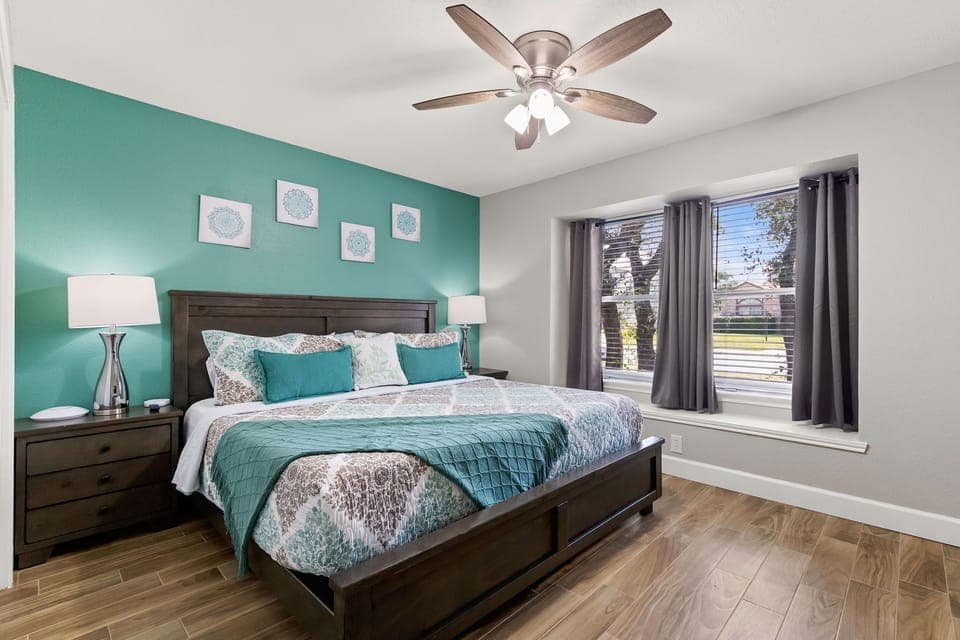 Escape to our tranquil bedroom sanctuary, boasting a comfortable king-sized bed and a TV for your ultimate comfort and enjoyment