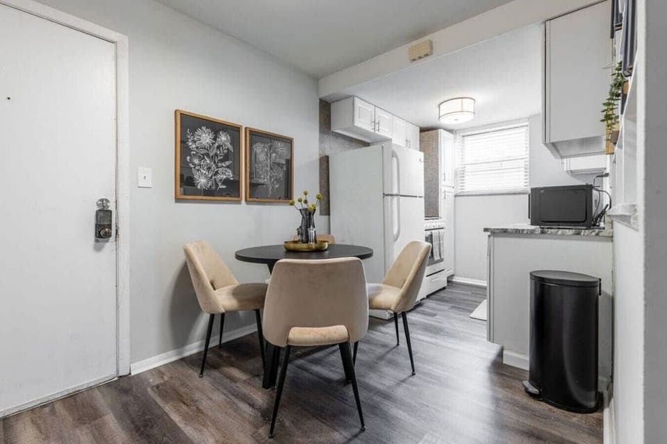 Sit down and enjoy a meal at our dining table conveniently located in the kitchen area