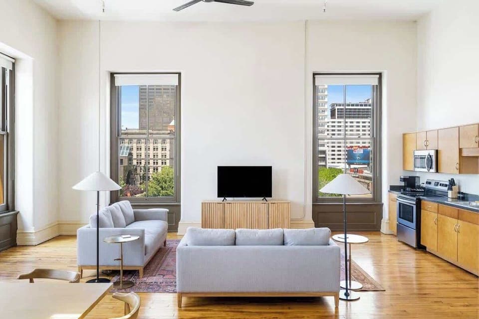 Bright, secure, corner loft in the BEST walkable location!