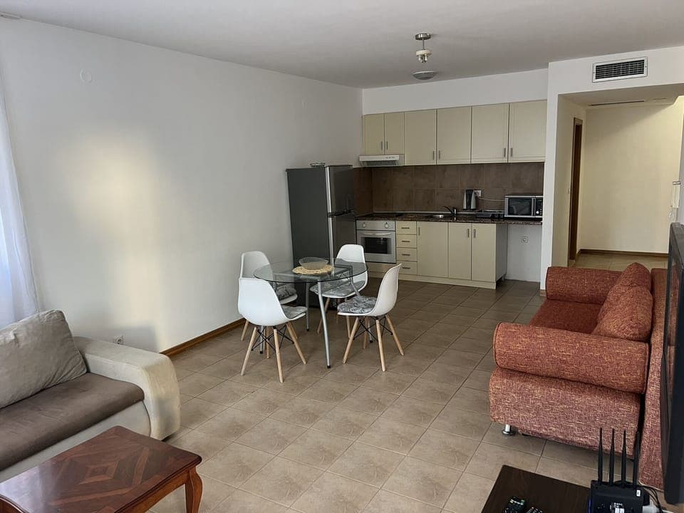 Dining area with fully equipped kitchen