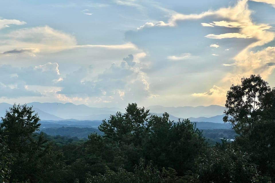 Gorgeous views of the Blue Ridge Mountains from the covered front porch