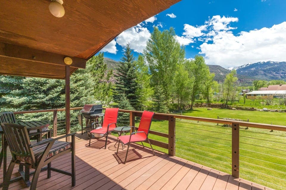 Deck with Outdoor Furniture and Grill with Mountain Views - Overlooking Yard
