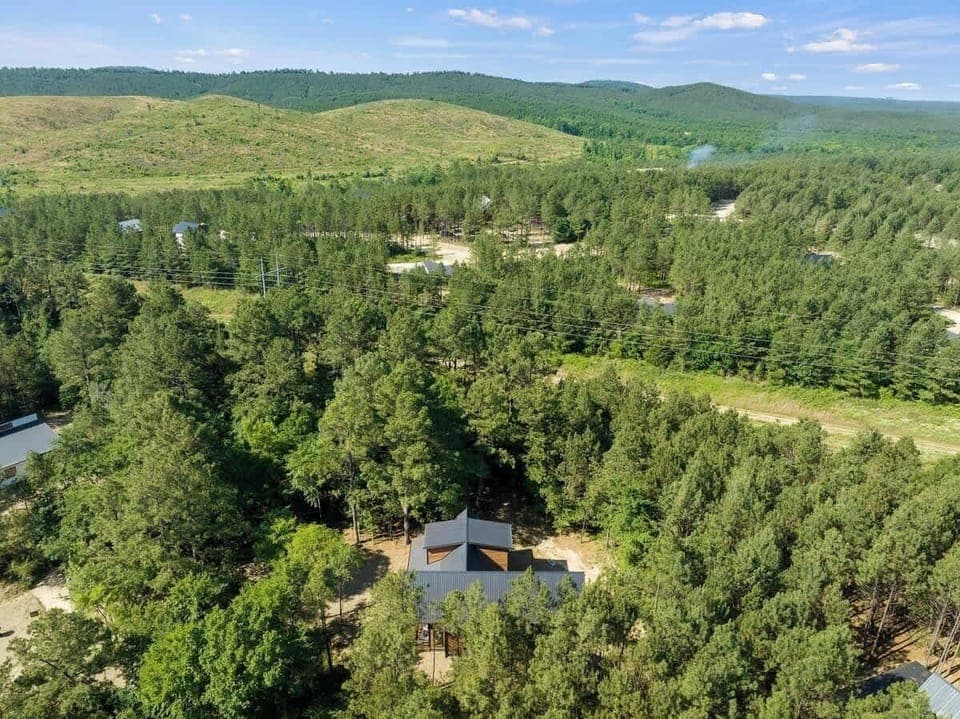 The home is located in Broken Bow, in a forest environment that offers plenty of privacy. 
| Stillwater Creek by Boutiq Luxury Vacation Rentals | Broken Bow, Oklahoma