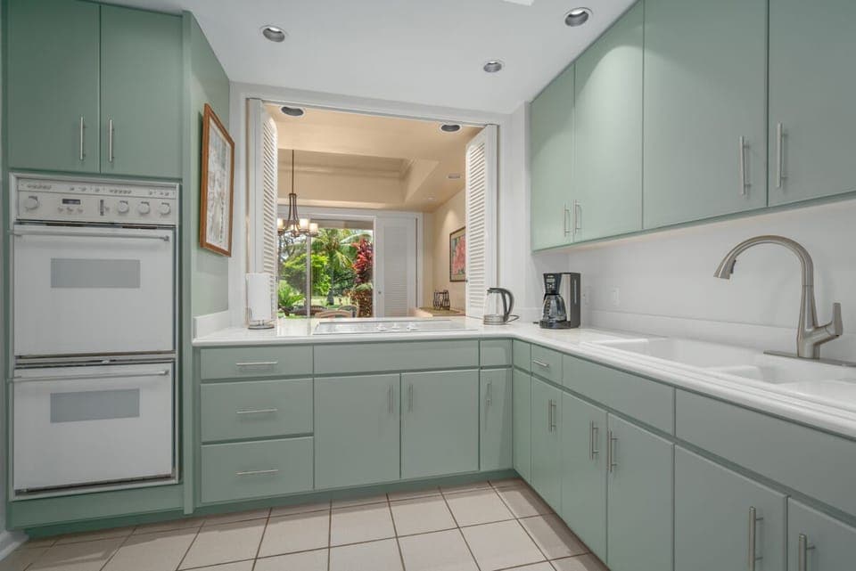 The kitchen has a pass through window to the dining room.  You can see the garden while cooking.
