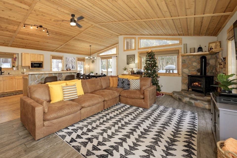 Free standing fireplace and sectional sofa