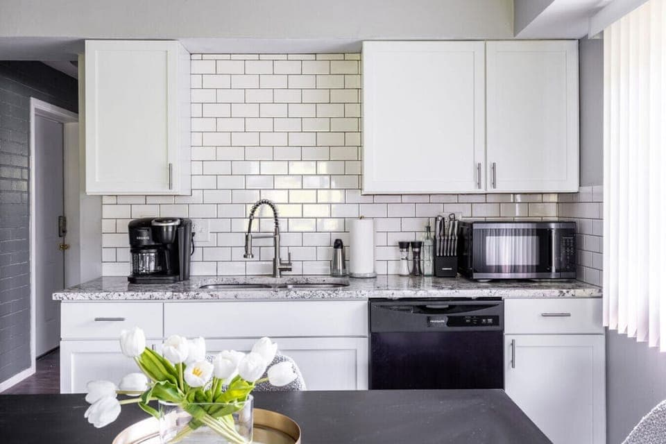 Prepare your favorite meals in this tidy and pristine kitchen