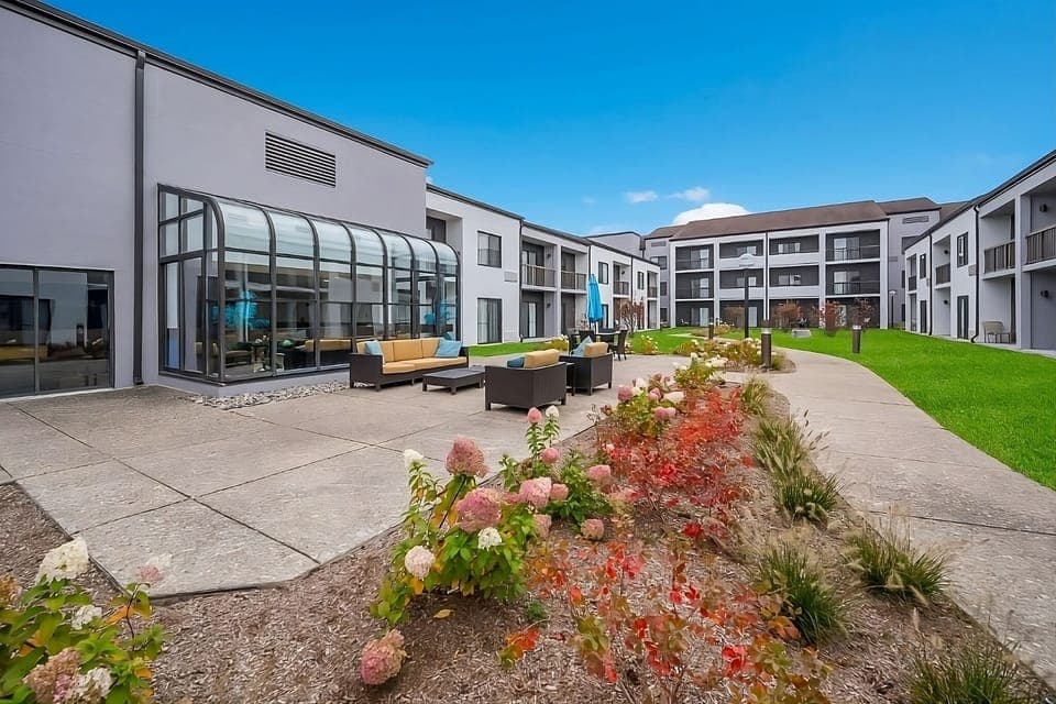 Stretch out outdoors in a sunny courtyard lounge setting.