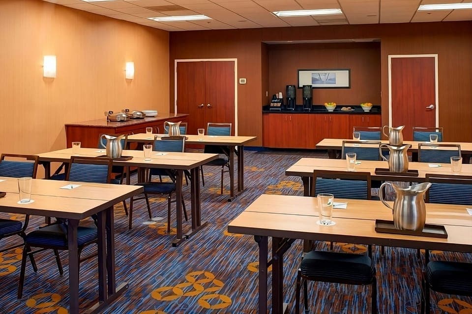 Host productive meetings in a quiet room with refreshment station.