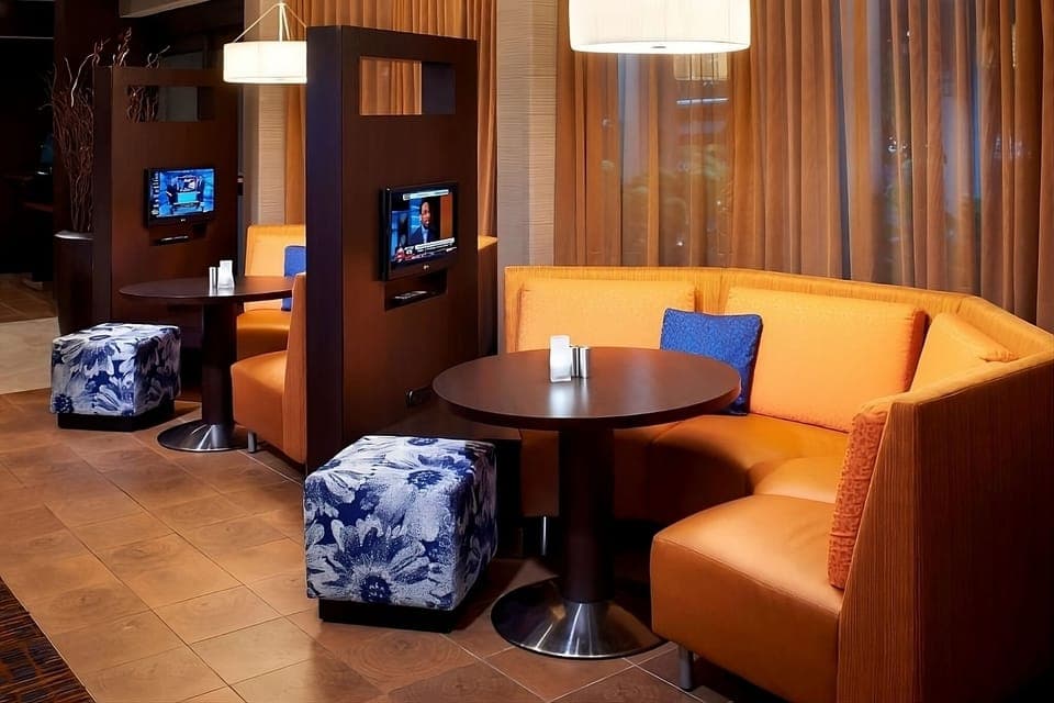 Settle into warm booths for relaxed evening conversation.