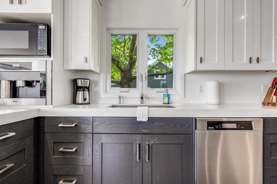 Step into the modern kitchen with premium appliances.