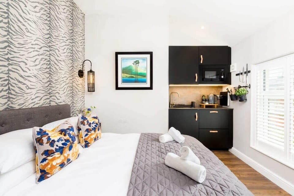 Bedroom with kitchenette