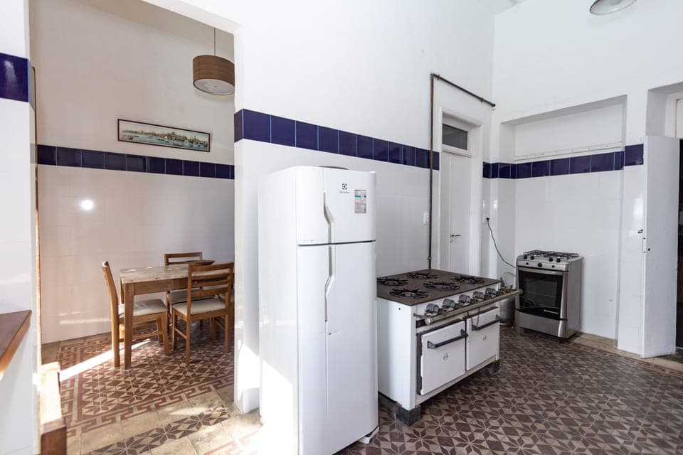 Main kitchen has the original oven and a modern gas oven & cooktop & dishwasher